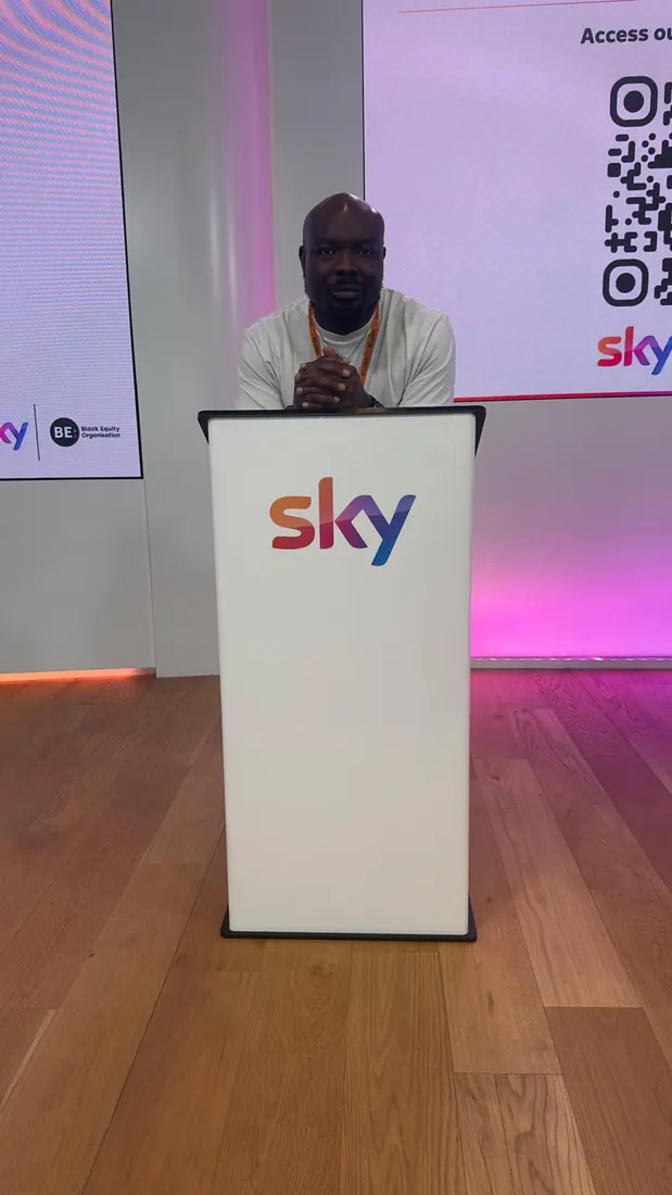 Sope Agbelusi facilitating in a corporate room